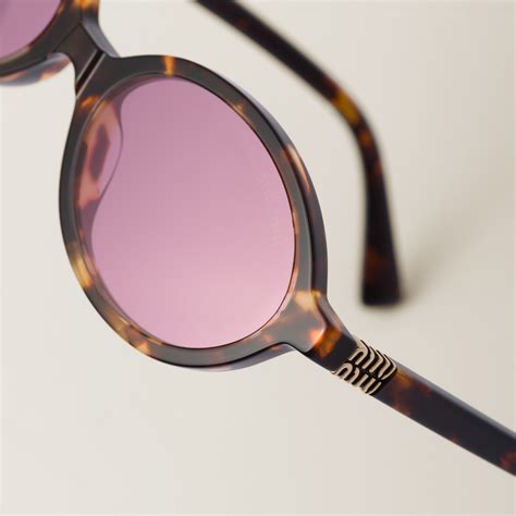 MIU MIU Miu Regard sunglasses .